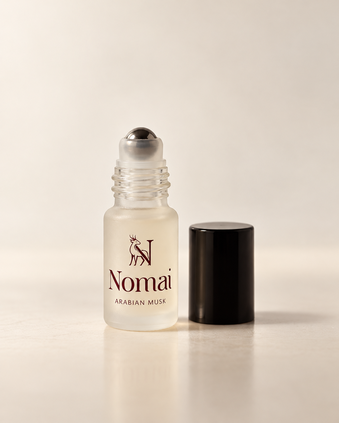 Musc Sucré, flacon roll-on 3 ml ouvert et son bouchon